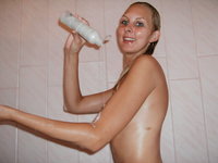 Beautiful amateur blonde girl at shower