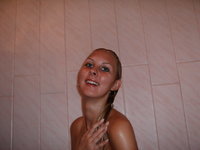 Beautiful amateur blonde girl at shower