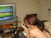 Busty teen gamer girl nude posing pics