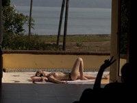 Teenage amateur GFs sunbathing topless