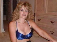 Busty US curly blond MILF