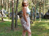 Blonde amateur wife posing at forest