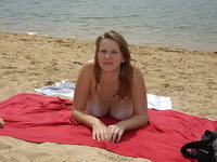 Daria posing topless at beach