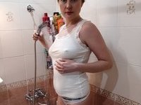 Naughty MILF masturbating during her hot bath