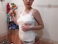Naughty MILF masturbating during her hot bath