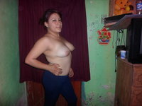 Amateur wife topless at home