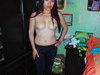 Asian amateur girl topless at home