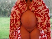 Pregnant housewife posing naked