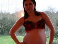 Pregnant housewife posing naked