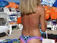 Beautiful amateur blonde girl topless at beach