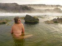 Two amateur GFs swim in a thermal spring