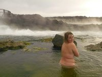 Two amateur GFs swim in a thermal spring