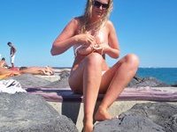 Cute amateur blonde wife posing at beach