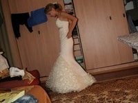 Sexy bride try on her dresses