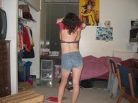 Amateur wife with long hair posing at home
