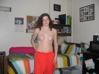 Amateur wife with long hair posing at home