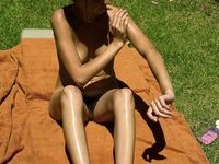 Skinny young amateur GF sunbathing naked