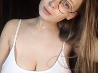 Nerdy glasses GF showing her tits