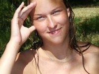 Nora sunbathing topless