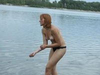 Redhead amateur wife topless at riverside