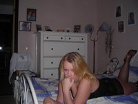 Blonde amateur wife posing on bed
