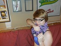 Amateur wife in glasses posing at home