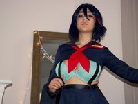 Sexy cosplay babe with big tits
