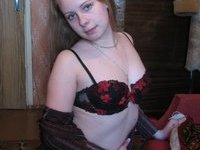 Russian amateur blonde wife posing at home