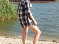 Amateur brunette posing at riverside