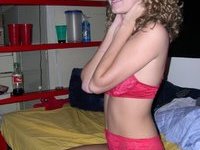 Curly amateur blonde GF posing on bed
