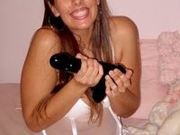 Sexy brunette loves her toys