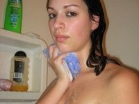 Busty amateur girl takes super sexy bath pics