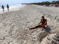 MILF at nude beach