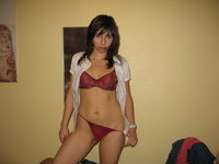 Amateur teen posing on bed