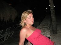 Cute blond girl showing tits at beach