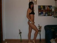 Amateur brunette posing naked