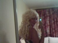 Blond MILF with long hair selfies