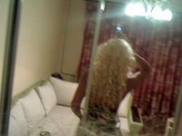 Blond MILF with long hair selfies