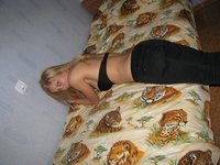 Blond amateur wife posing on bed