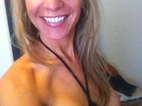 Sexy busty blond MILF private pics