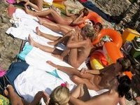 Nudist amateurs at beach and yacht