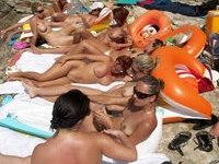 Nudist amateurs at beach and yacht