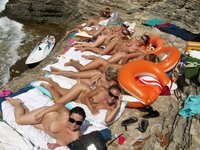 Nudist amateurs at beach and yacht