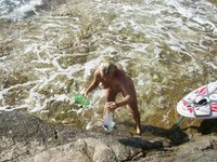 Nudist amateurs at beach and yacht