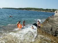 Nudist amateurs at beach and yacht