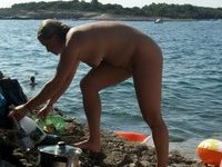 Nudist amateurs at beach and yacht