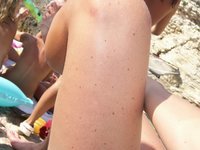 Nudist amateurs at beach and yacht