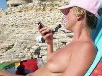 Nudist amateurs at beach and yacht