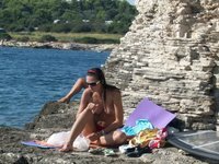 Nudist amateurs at beach and yacht