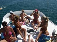 Nudist amateurs at beach and yacht